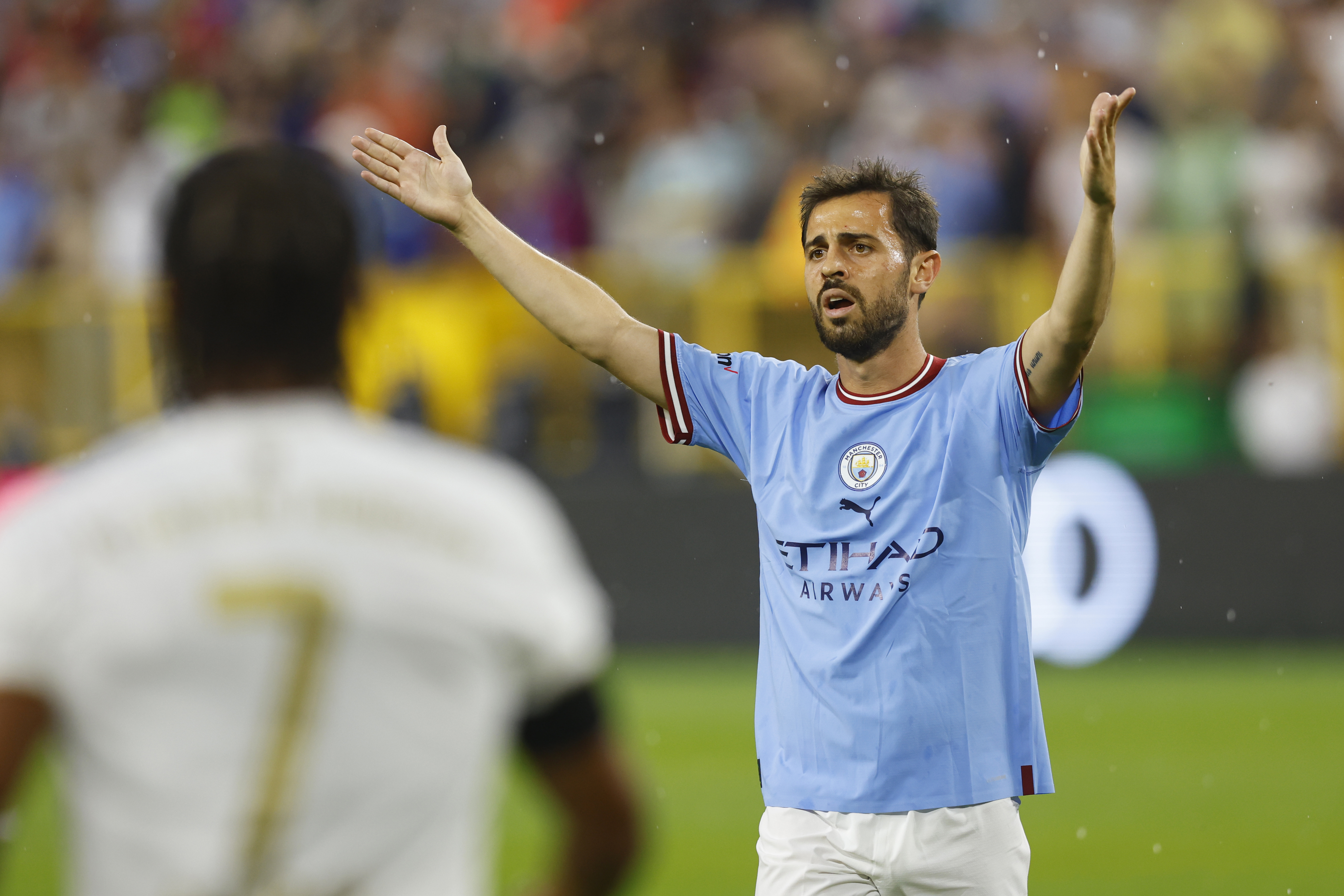 Jul 23, 2022; Green Bay, WI, USA;  Manchester City FC midfielder Bernardo Silva (20) reacts to a call during the second half against FC Bayern Munich at Lambeau Field. Mandatory Credit: Jeff Hanisch-USA TODAY Sports