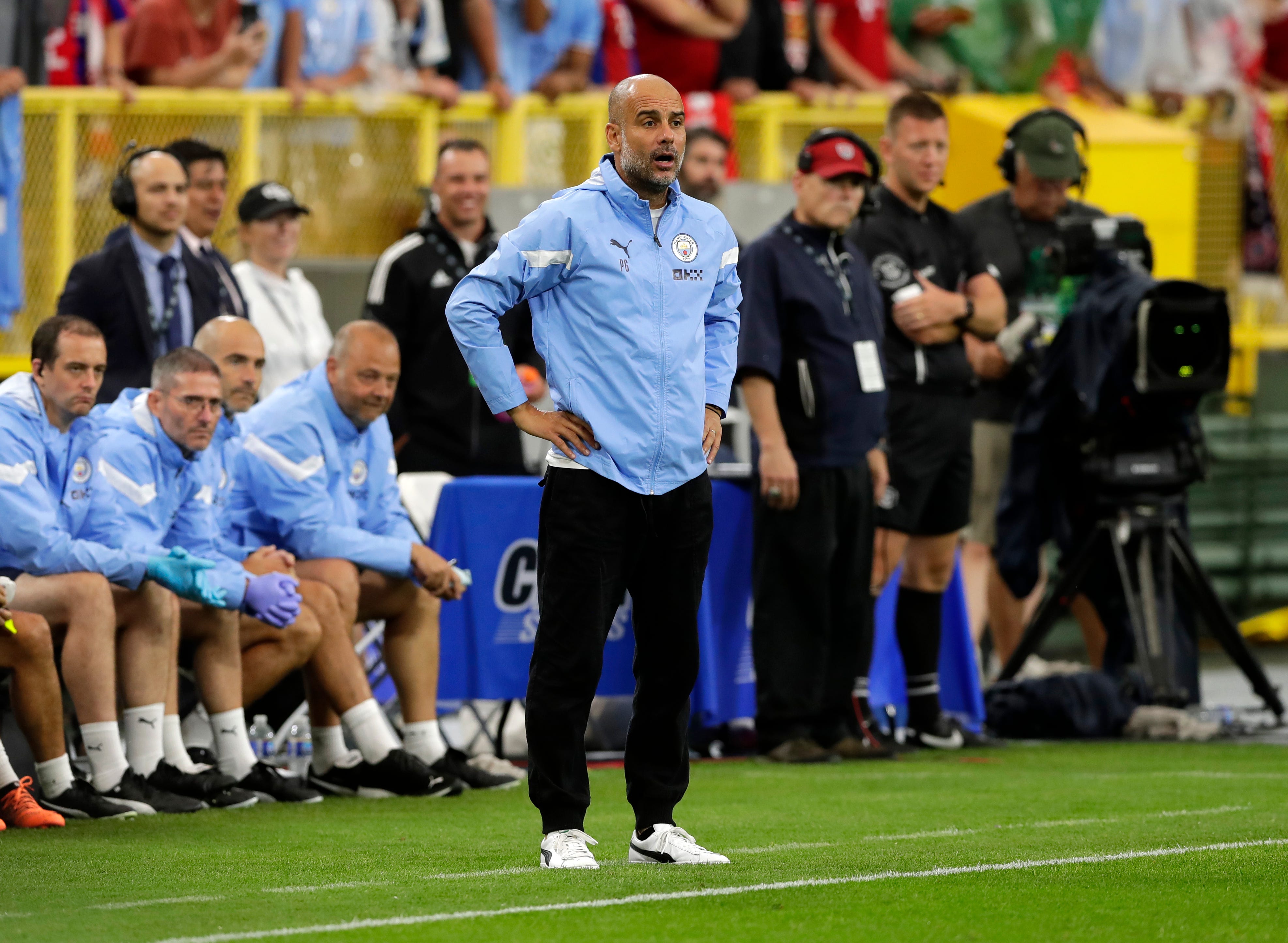 Manchester City manager Pep Guardiola watches a play during the team's exhibition match against FC Bayern Munich at Lambeau Field on July 23, 2022, in Green Bay, Wis.  Gpg Lambeausoccer 072322 Sk48