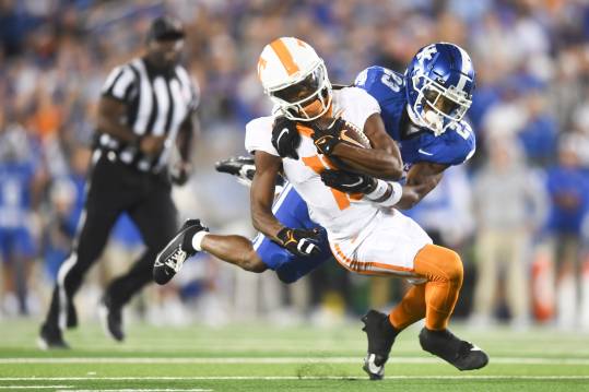 Tennessee wide receiver Squirrel White (10) is tackled by Kentucky defensive back Andru Phillips (23) during a football game between Kentucky and Tennessee at Kroger Field in Lexington, Kentucky, Saturday, Oct. 28, 2023.