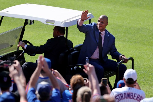 Jun 1, 2024; New York City, New York, USA; New York Mets former player Darryl Strawberry waves to fans from the back of a golf cart after his number 18 was retired in a ceremony before a game against the Arizona Diamondbacks at Citi Field. Mandatory Credit: Brad Penner-USA TODAY Sports