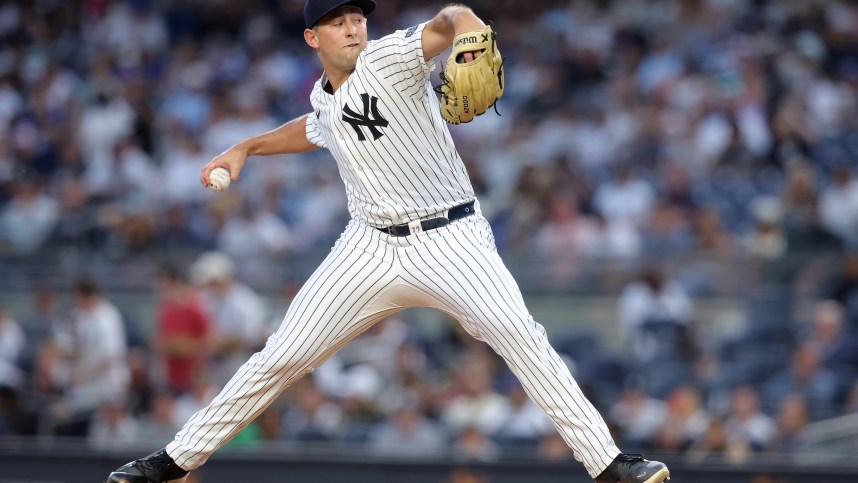 Jun 7, 2024; Bronx, New York, USA; New York Yankees starting pitcher Cody Poteet (72) pitches against the Los Angeles Dodgers during the first inning at Yankee Stadium. Mandatory Credit: Brad Penner-USA TODAY Sports