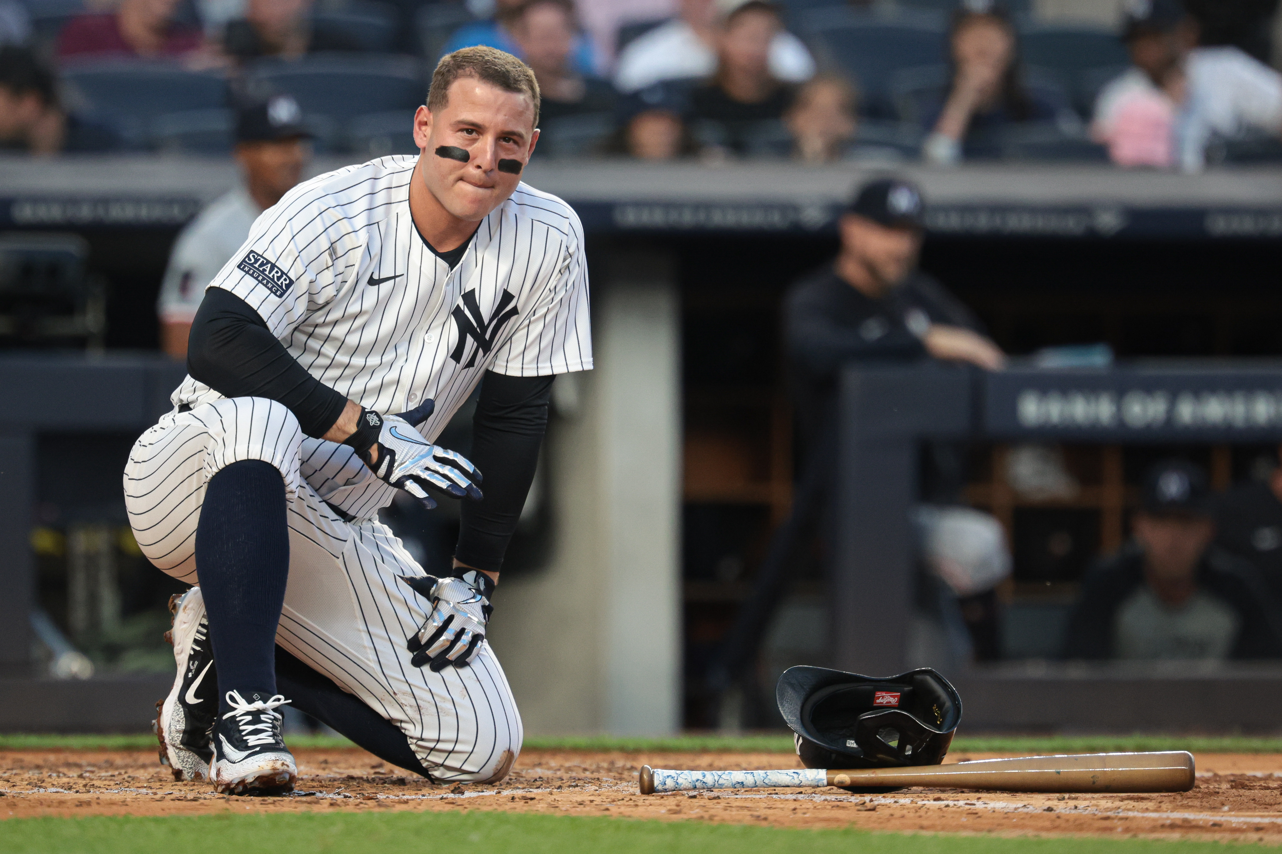 Jun 6, 2024; Bronx, New York, USA; New York Yankees first baseman Anthony Rizzo (48) reacts after being hit by a foul ball during the third inning against the Minnesota Twins at Yankee Stadium. Mandatory Credit: Vincent Carchietta-USA TODAY Sports