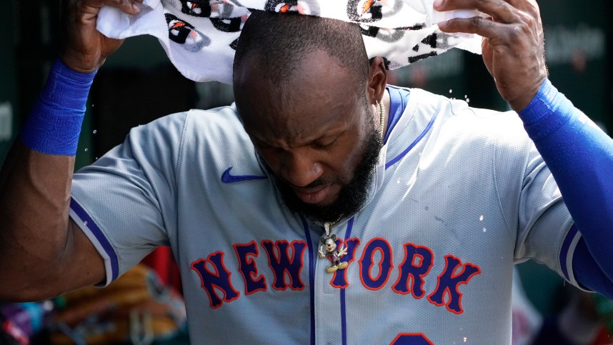 Jun 21, 2024; Chicago, Illinois, USA; New York Mets outfielder Starling Marte (6) cools off in the dugout against the Chicago Cubs during the seventh inning at Wrigley Field. Mandatory Credit: David Banks-USA TODAY Sports