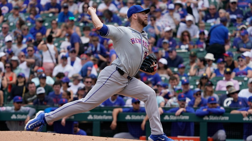 Jun 22, 2024; Chicago, Illinois, USA; New York Mets pitcher Tylor Megill (38) throws the ball against the Chicago Cubs during the first inning at Wrigley Field. Mandatory Credit: David Banks-USA TODAY Sports