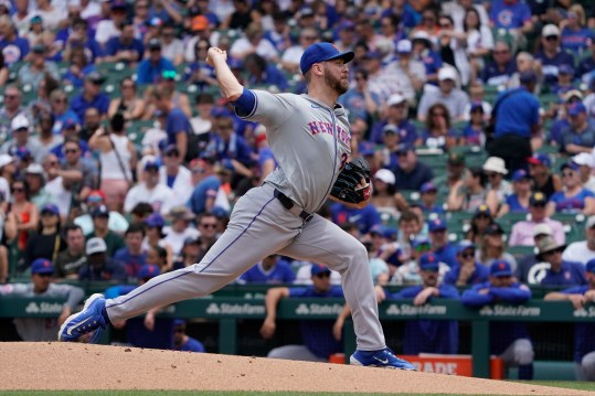 Jun 22, 2024; Chicago, Illinois, USA; New York Mets pitcher Tylor Megill (38) throws the ball against the Chicago Cubs during the first inning at Wrigley Field. Mandatory Credit: David Banks-USA TODAY Sports