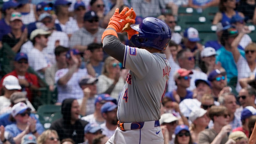 Jun 22, 2024; Chicago, Illinois, USA; New York Mets catcher Francisco Alvarez (4) gestures after hitting a home run against the Chicago Cubs during the fifth inning at Wrigley Field. Mandatory Credit: David Banks-USA TODAY Sports