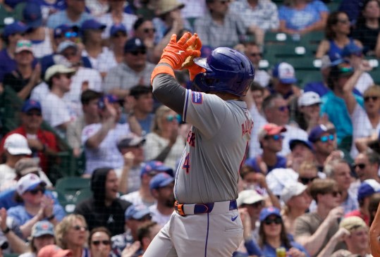 Jun 22, 2024; Chicago, Illinois, USA; New York Mets catcher Francisco Alvarez (4) gestures after hitting a home run against the Chicago Cubs during the fifth inning at Wrigley Field. Mandatory Credit: David Banks-USA TODAY Sports
