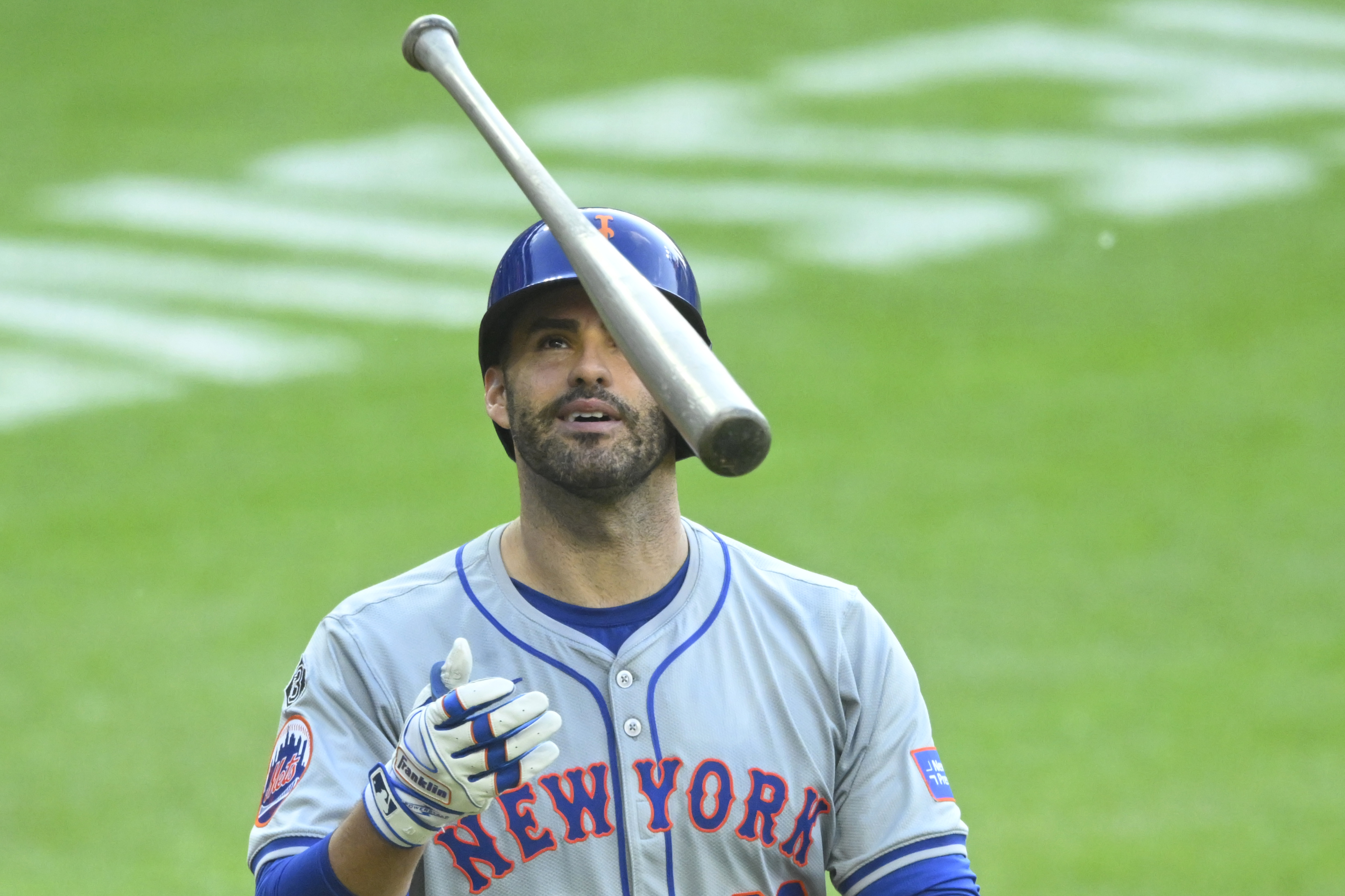 May 21, 2024; Cleveland, Ohio, USA; New York Mets designated hitter J.D. Martinez (28) tosses his bat after striking out in the fifth inning against the Cleveland Guardians at Progressive Field. Mandatory Credit: David Richard-USA TODAY Sports