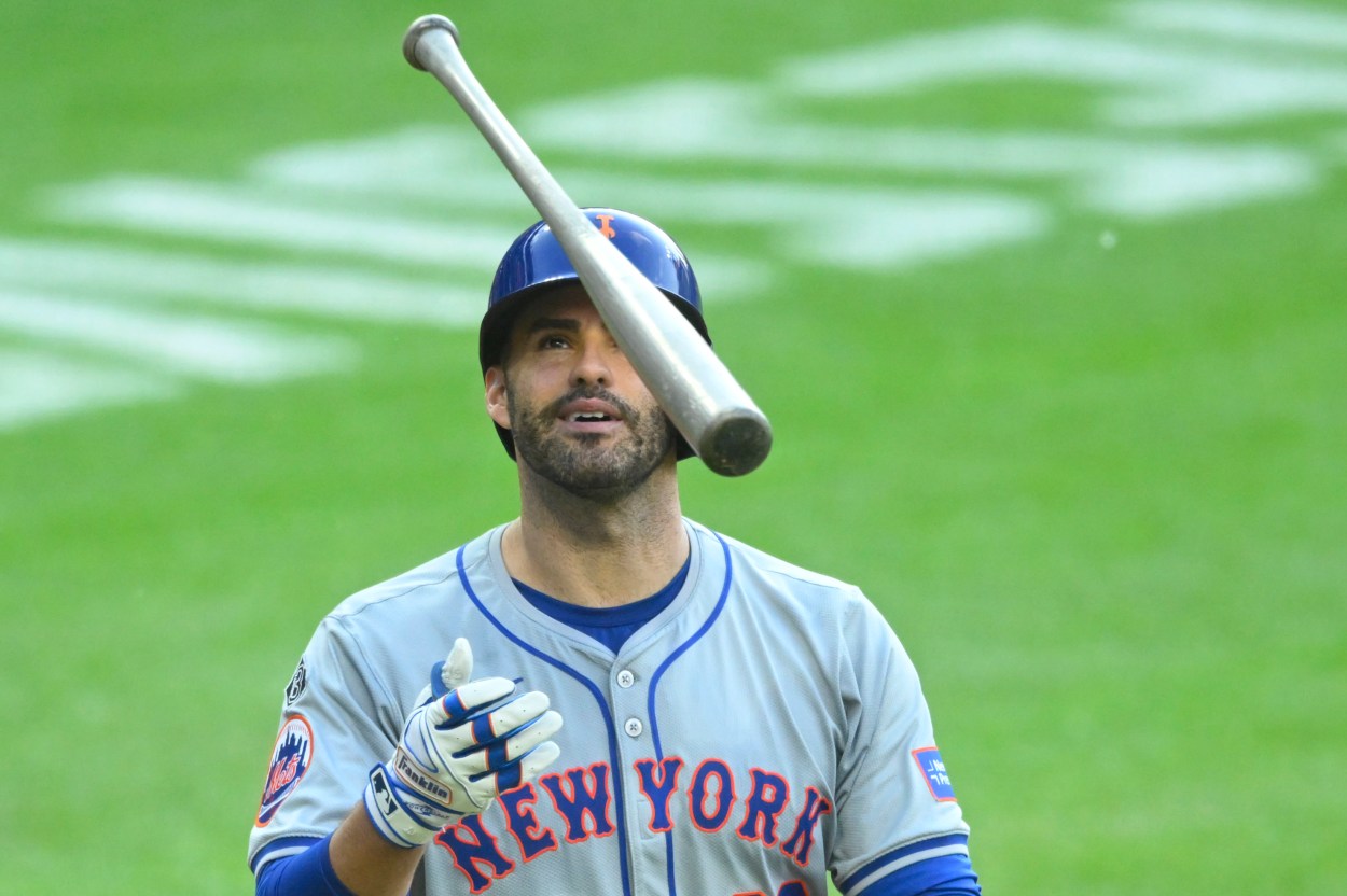 May 21, 2024; Cleveland, Ohio, USA; New York Mets designated hitter J.D. Martinez (28) tosses his bat after striking out in the fifth inning against the Cleveland Guardians at Progressive Field. Mandatory Credit: David Richard-USA TODAY Sports