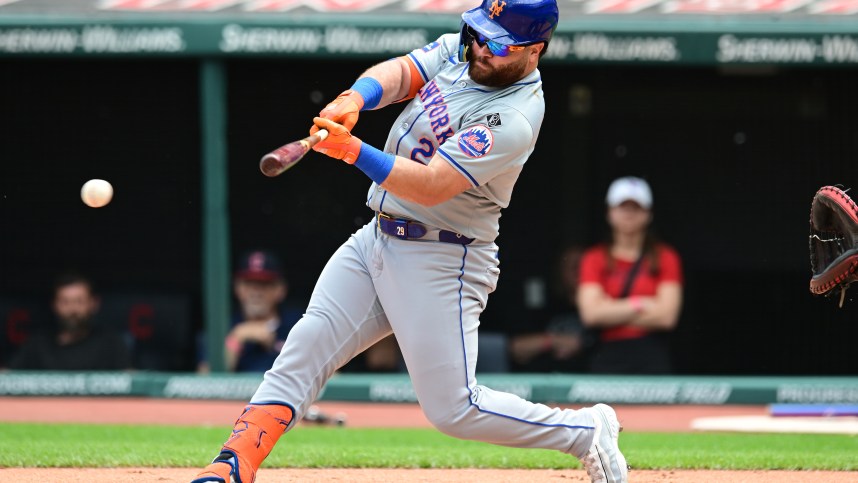 May 22, 2024; Cleveland, Ohio, USA; New York Mets right fielder DJ Stewart (29) hits a single during the first inning against the Cleveland Guardians at Progressive Field. Mandatory Credit: Ken Blaze-USA TODAY Sports