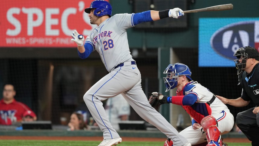 Jun 17, 2024; Arlington, Texas, USA; New York Mets designated hitter J.D. Martinez (28) follows through on his single against the Texas Rangers during the first inning at Globe Life Field. Mandatory Credit: Jim Cowsert-USA TODAY Sports