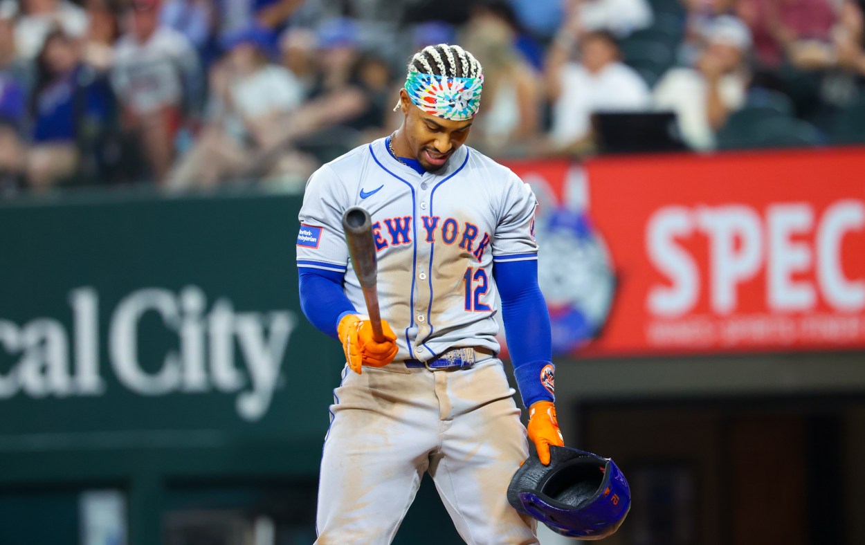 Jun 19, 2024; Arlington, Texas, USA; New York Mets shortstop Francisco Lindor (12) reacts after striking out during the seventh inning against the Texas Rangers at Globe Life Field. Mandatory Credit: Kevin Jairaj-USA TODAY Sports