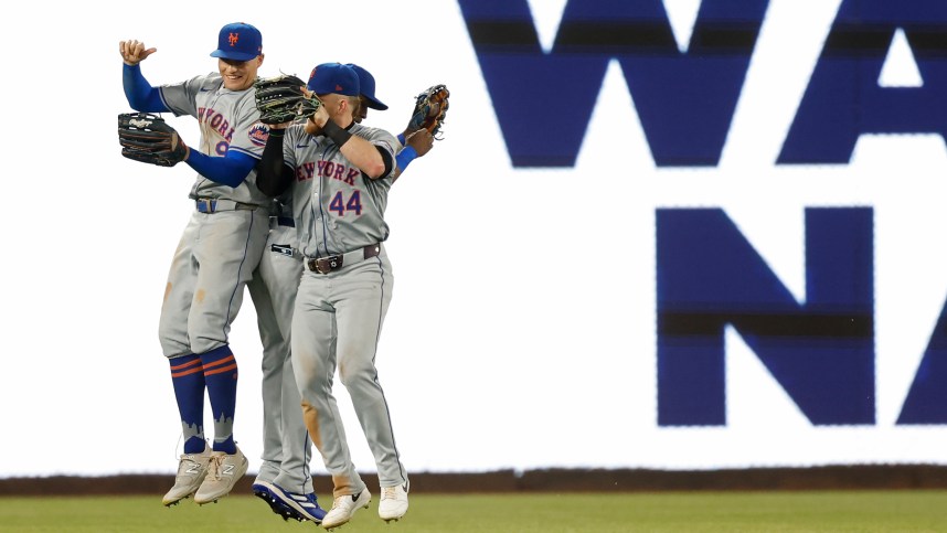 Jun 4, 2024; Washington, District of Columbia, USA; New York Mets outfielder Brandon Nimmo (9) Mets outfielder Harrison Bader (44), and Mets outfielder Starling Marte (6) celebrate after their game against the Washington Nationals at Nationals Park. Mandatory Credit: Geoff Burke-USA TODAY Sports