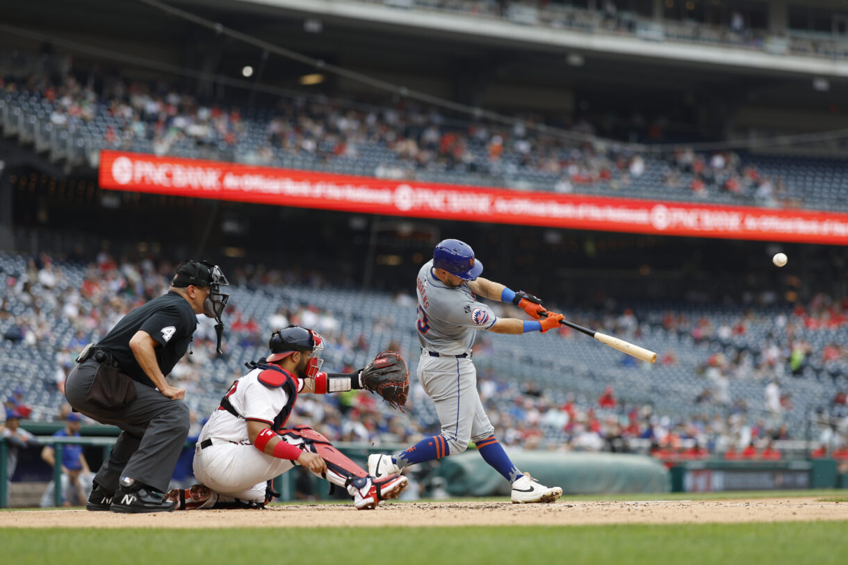 Jun 5, 2024; Washington, District of Columbia, USA; New York Mets catcher Luis Torrens (13) hits a solo home run against the Washington Nationals during the third inning at Nationals Park. Mandatory Credit: Geoff Burke-USA TODAY Sports