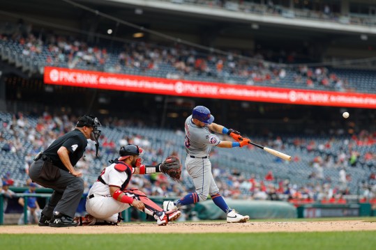 Jun 5, 2024; Washington, District of Columbia, USA; New York Mets catcher Luis Torrens (13) hits a solo home run against the Washington Nationals during the third inning at Nationals Park. Mandatory Credit: Geoff Burke-USA TODAY Sports
