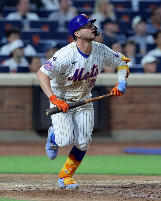 Jun 25, 2024; New York City, New York, USA; New York Mets first baseman Pete Alonso (20) watches his RBI sacrifice fly during the sixth inning against the New York Yankees at Citi Field. Mandatory Credit: Brad Penner-USA TODAY Sports