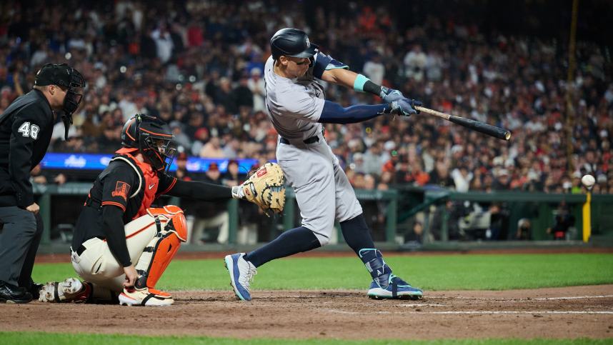 Jun 1, 2024; San Francisco, California, USA; New York Yankees outfielder Aaron Judge (99) hits a single against the San Francisco Giants during the eighth inning at Oracle Park. Mandatory Credit: Robert Edwards-USA TODAY Sports