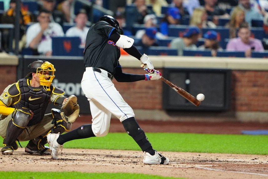 Jun 14, 2024; New York City, New York, USA; New York Mets left fielder Brandon Nimmo (9) hits a single against the San Diego Padres during the third inning at Citi Field. Mandatory Credit: Gregory Fisher-USA TODAY Sports