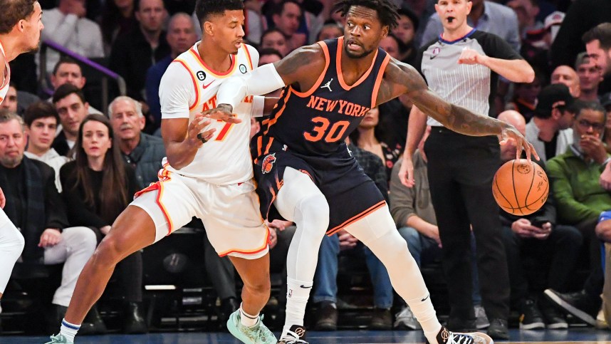 Dec 7, 2022; New York, New York, USA;   New York Knicks forward Julius Randle (30) dribbles the ball defended by Atlanta Hawks guard Jarrett Culver (7) during the first quarter at Madison Square Garden. Mandatory Credit: Dennis Schneidler-USA TODAY Sports