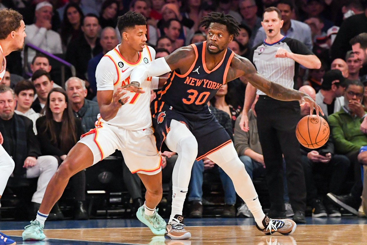 Dec 7, 2022; New York, New York, USA;   New York Knicks forward Julius Randle (30) dribbles the ball defended by Atlanta Hawks guard Jarrett Culver (7) during the first quarter at Madison Square Garden. Mandatory Credit: Dennis Schneidler-USA TODAY Sports