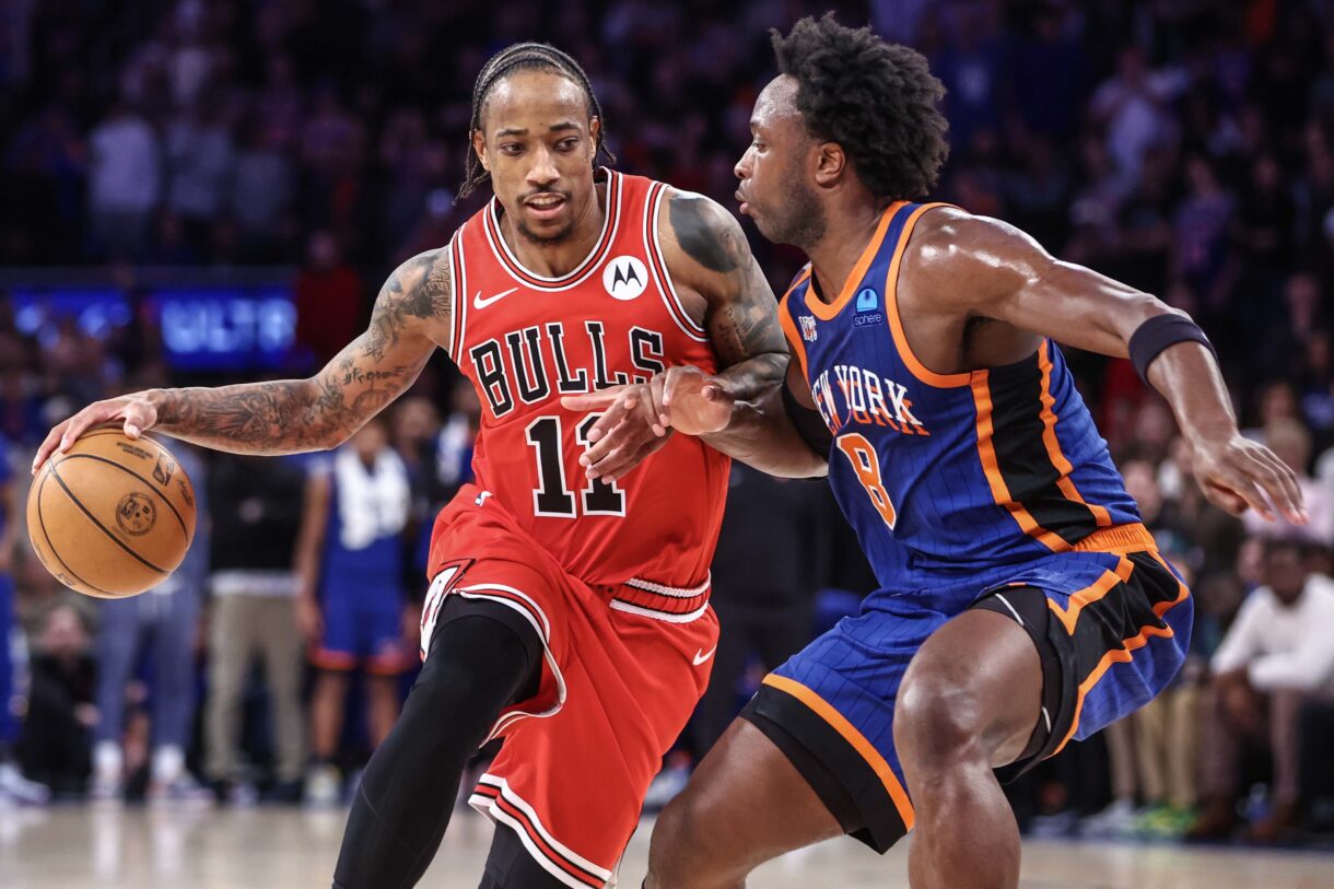 Apr 14, 2024; New York, New York, USA;  Chicago Bulls forward DeMar DeRozan (11) looks to drive past New York Knicks forward OG Anunoby (8) in the fourth quarter at Madison Square Garden. Mandatory Credit: Wendell Cruz-USA TODAY Sports
