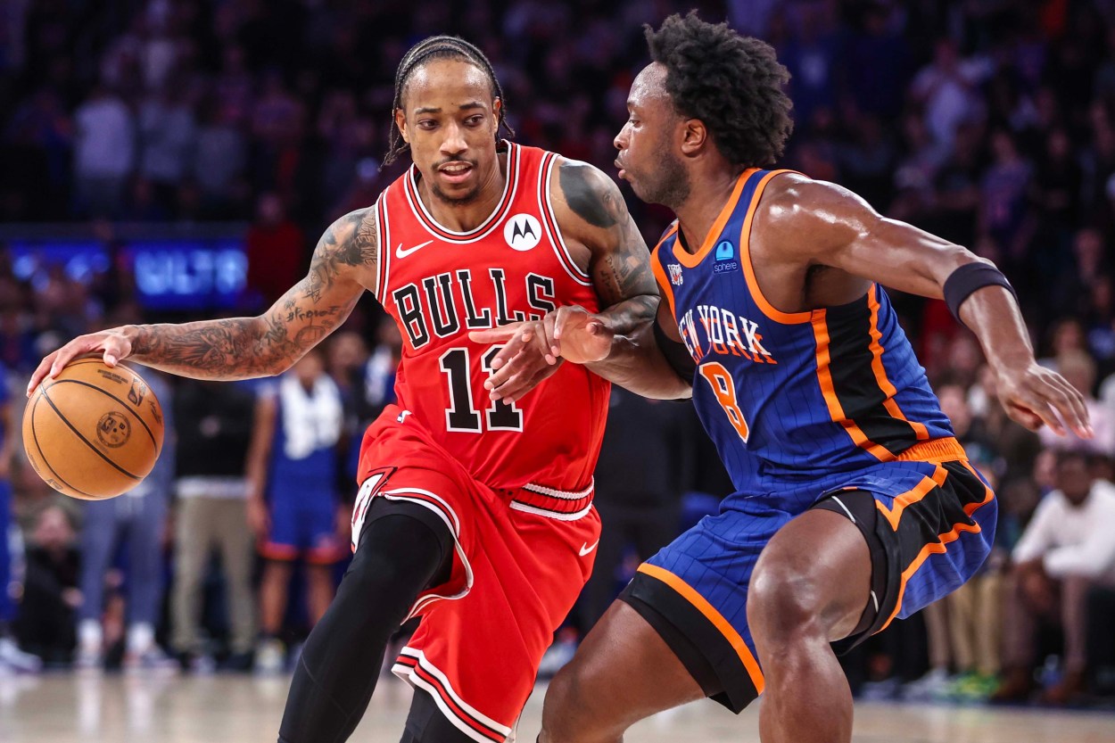 Apr 14, 2024; New York, New York, USA;  Chicago Bulls forward DeMar DeRozan (11) looks to drive past New York Knicks forward OG Anunoby (8) in the fourth quarter at Madison Square Garden. Mandatory Credit: Wendell Cruz-USA TODAY Sports