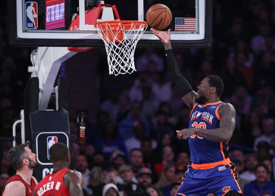 Jan 27, 2024; New York, New York, USA; New York Knicks forward Julius Randle (30) lays the ball up during the first half against the Miami Heat cat Madison Square Garden. Mandatory Credit: Vincent Carchietta-USA TODAY Sports