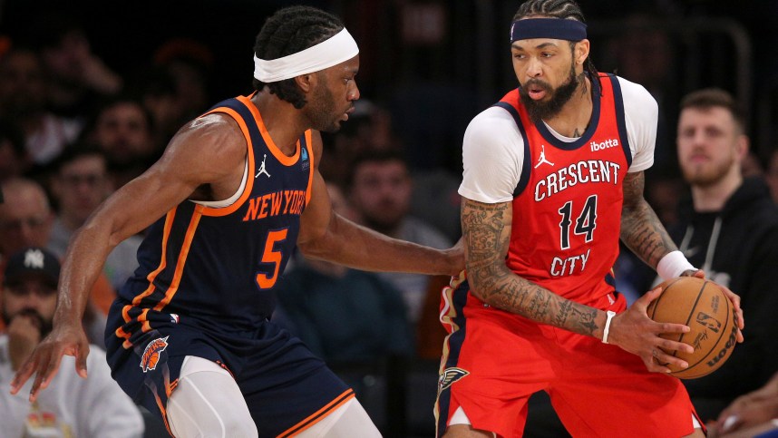 Feb 27, 2024; New York, New York, USA; New Orleans Pelicans forward Brandon Ingram (14) controls the ball against New York Knicks forward Precious Achiuwa (5) during the second quarter at Madison Square Garden. Mandatory Credit: Brad Penner-USA TODAY Sports