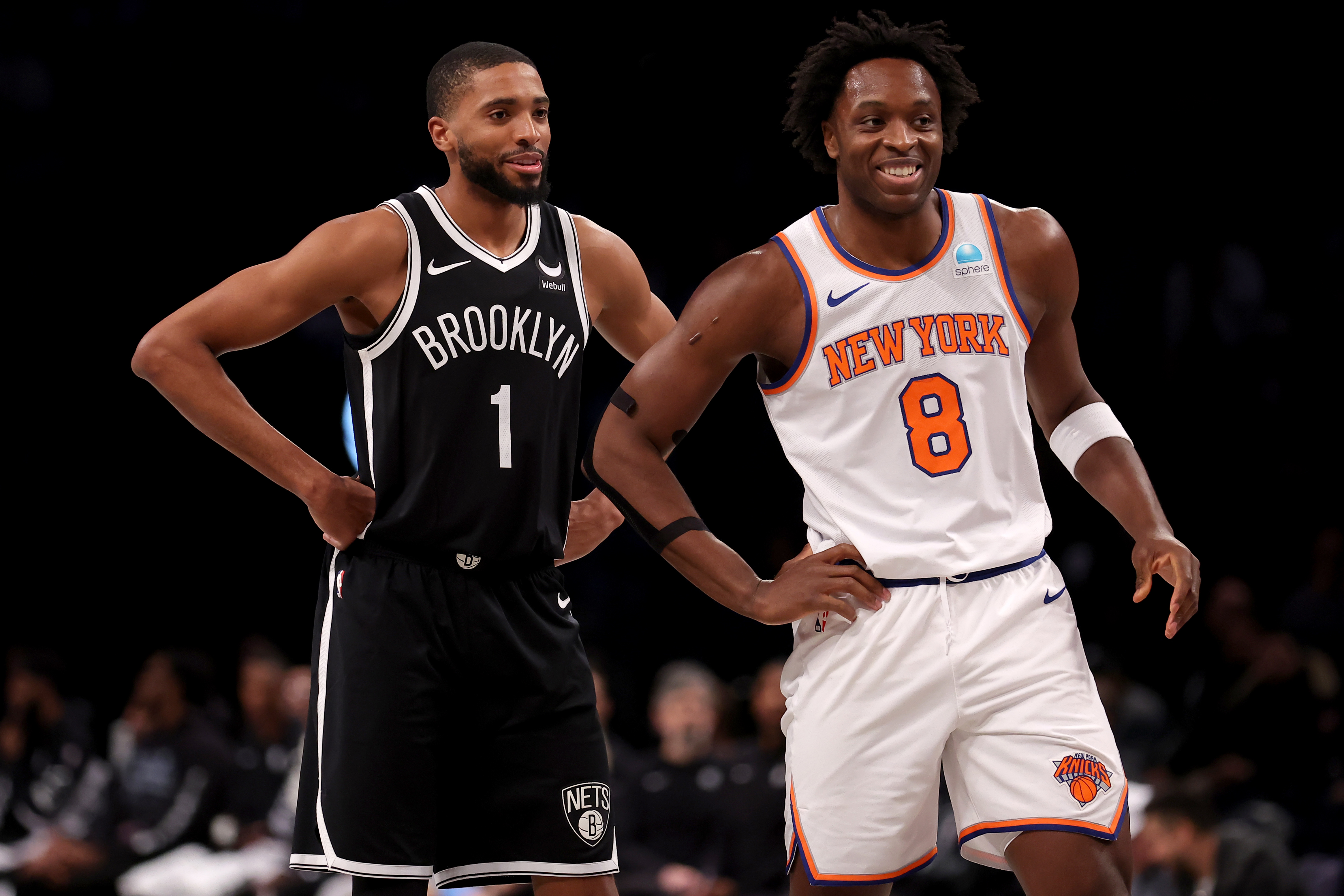 Jan 23, 2024; Brooklyn, New York, USA; Brooklyn Nets forward Mikal Bridges (1) talks to New York Knicks forward OG Anunoby (8) during the first quarter at Barclays Center. Mandatory Credit: Brad Penner-USA TODAY Sports
