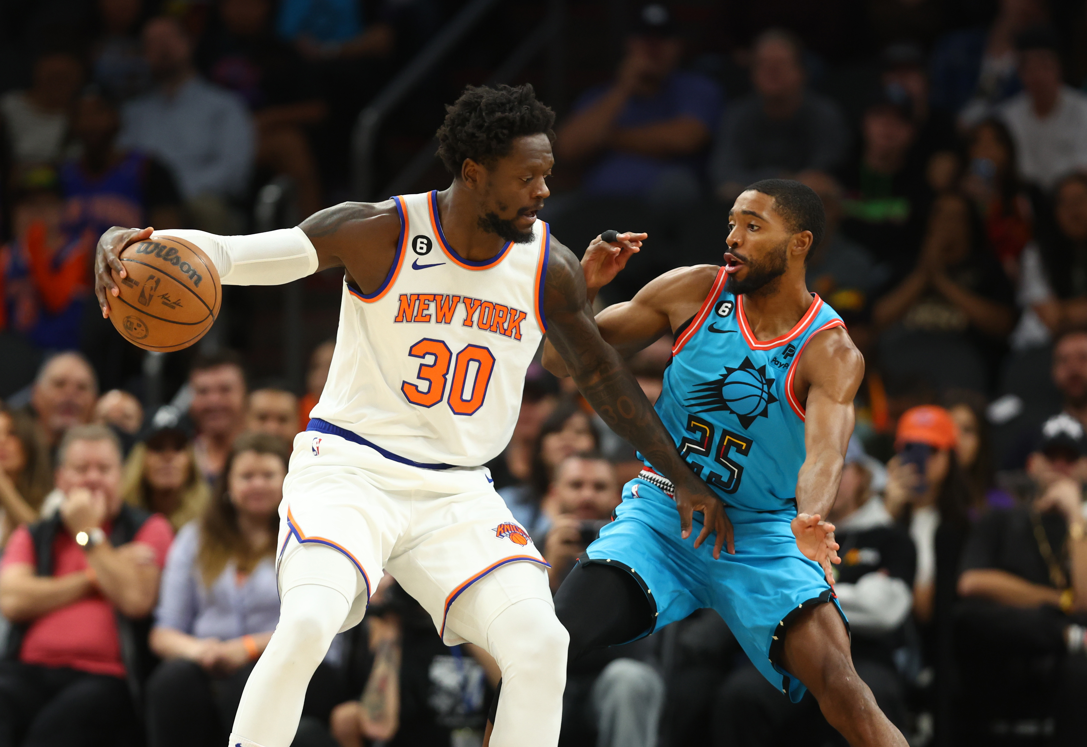 Nov 20, 2022; Phoenix, Arizona, USA; New York Knicks forward Julius Randle (30) against Phoenix Suns forward Mikal Bridges (25) at Footprint Center. Mandatory Credit: Mark J. Rebilas-USA TODAY Sports