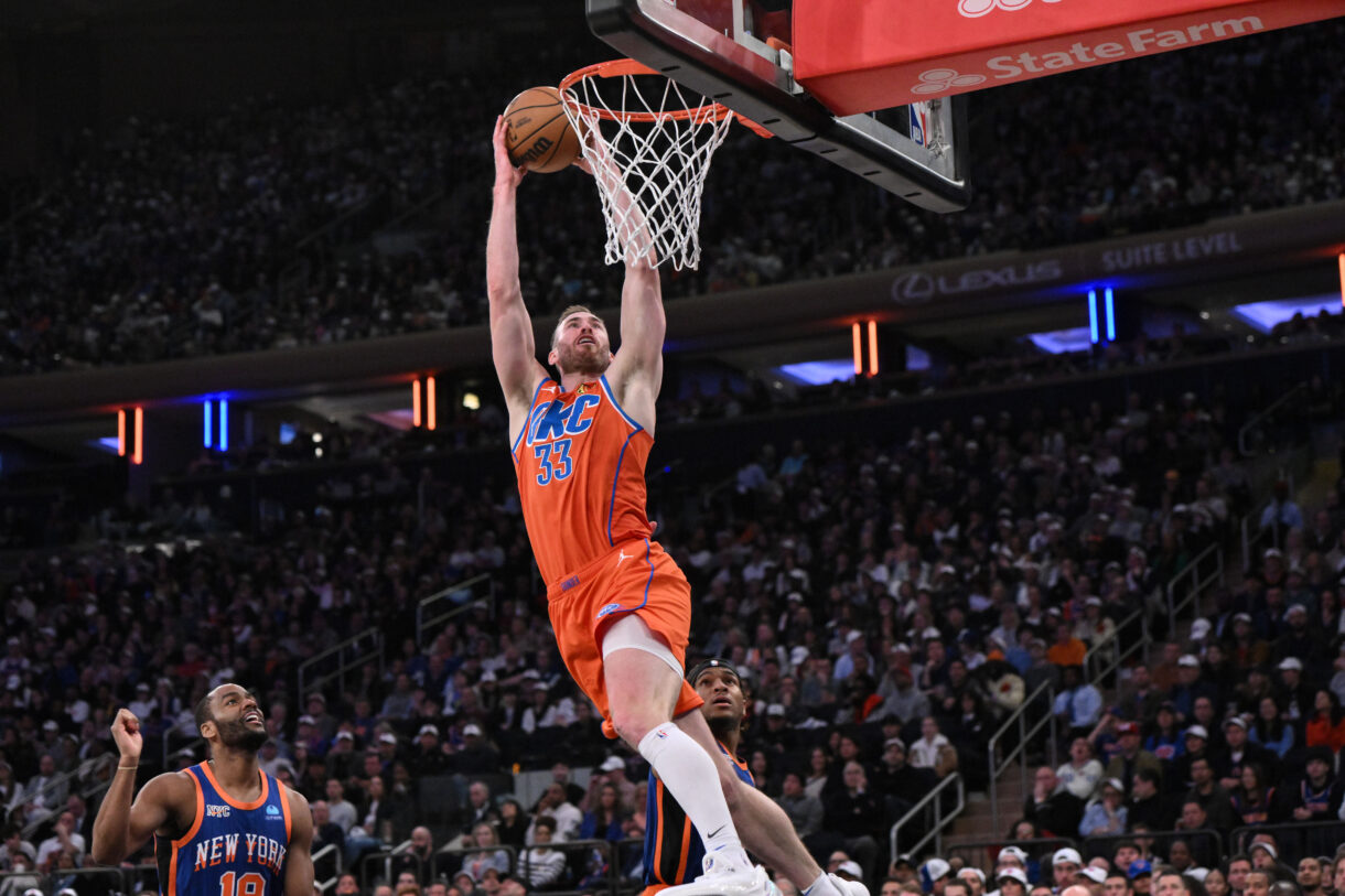 Mar 31, 2024; New York, New York, USA; Oklahoma City Thunder forward Gordon Hayward (33) catches a pass as New York Knicks guard Alec Burks (18) looks on during the third quarter at Madison Square Garden. Mandatory Credit: John Jones-USA TODAY Sports