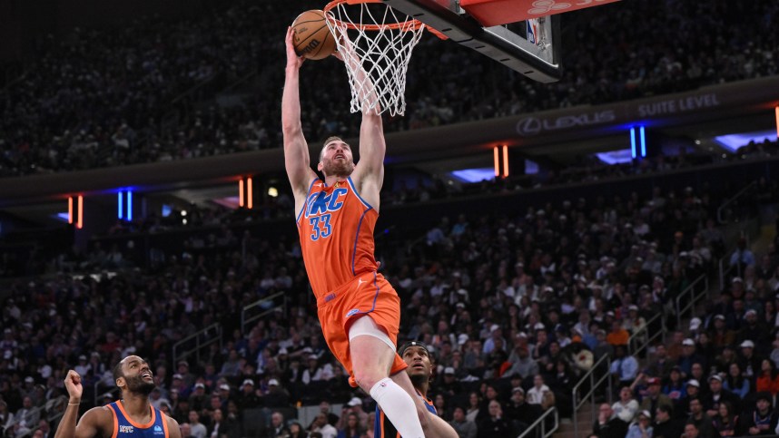 Mar 31, 2024; New York, New York, USA; Oklahoma City Thunder forward Gordon Hayward (33) catches a pass as New York Knicks guard Alec Burks (18) looks on during the third quarter at Madison Square Garden. Mandatory Credit: John Jones-USA TODAY Sports