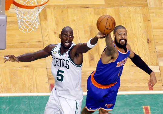 Apr 28, 2013; Boston, MA, USA; Boston Celtics center Kevin Garnett (5) and New York Knicks center Tyson Chandler (6) work for the rebound during overtime in game four of the first round of the 2013 NBA playoffs at TD Garden. The Celtics defeated the New York Knicks 97-90. Mandatory Credit: David Butler II-USA TODAY Sports