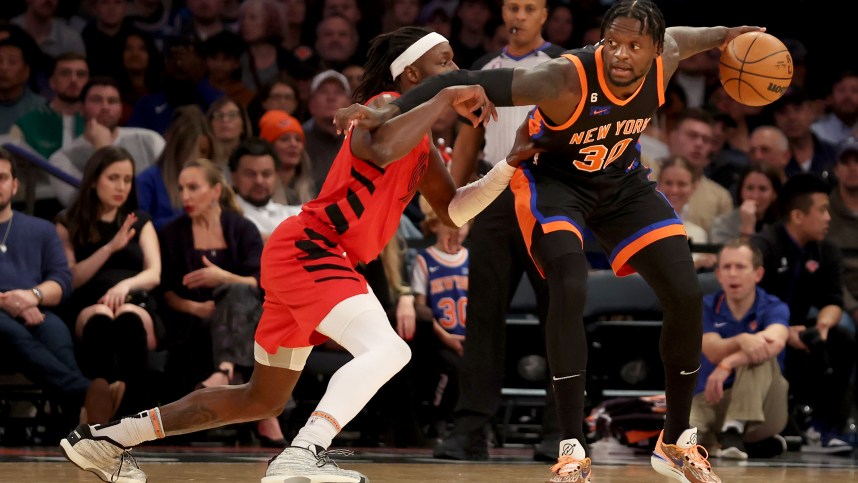 Nov 25, 2022; New York, New York, USA; New York Knicks forward Julius Randle (30) controls the ball against Portland Trail Blazers forward Jerami Grant (9) during the first quarter at Madison Square Garden. Mandatory Credit: Brad Penner-USA TODAY Sports