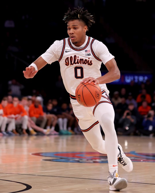 Dec 5, 2023; New York, New York, USA;  Illinois Fighting Illini guard Terrence Shannon Jr. (0) drives to the basket against the Florida Atlantic Owls during the first half at Madison Square Garden. Mandatory Credit: Brad Penner-USA TODAY Sports