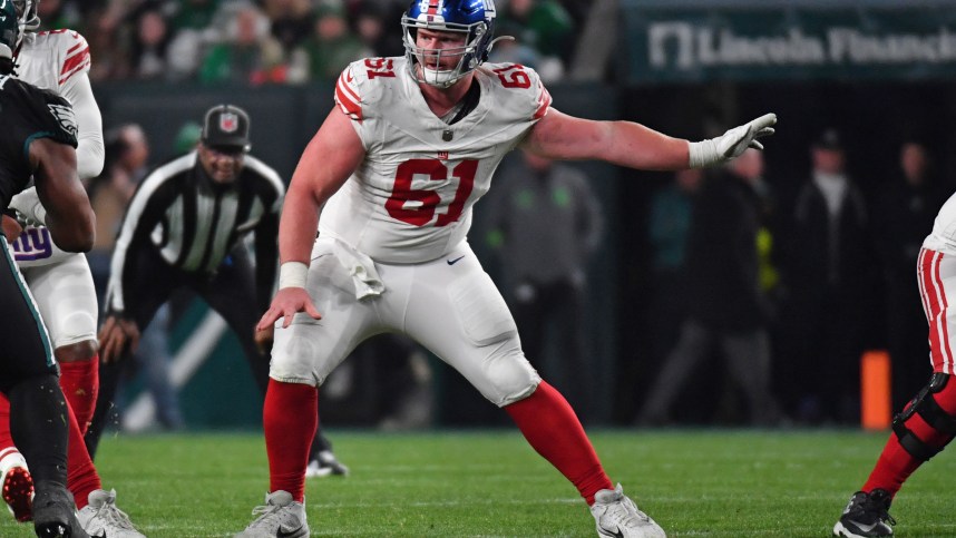 Dec 25, 2023; Philadelphia, Pennsylvania, USA; New York Giants center John Michael Schmitz Jr. (61) against the Philadelphia Eagles at Lincoln Financial Field. Mandatory Credit: Eric Hartline-USA TODAY Sports