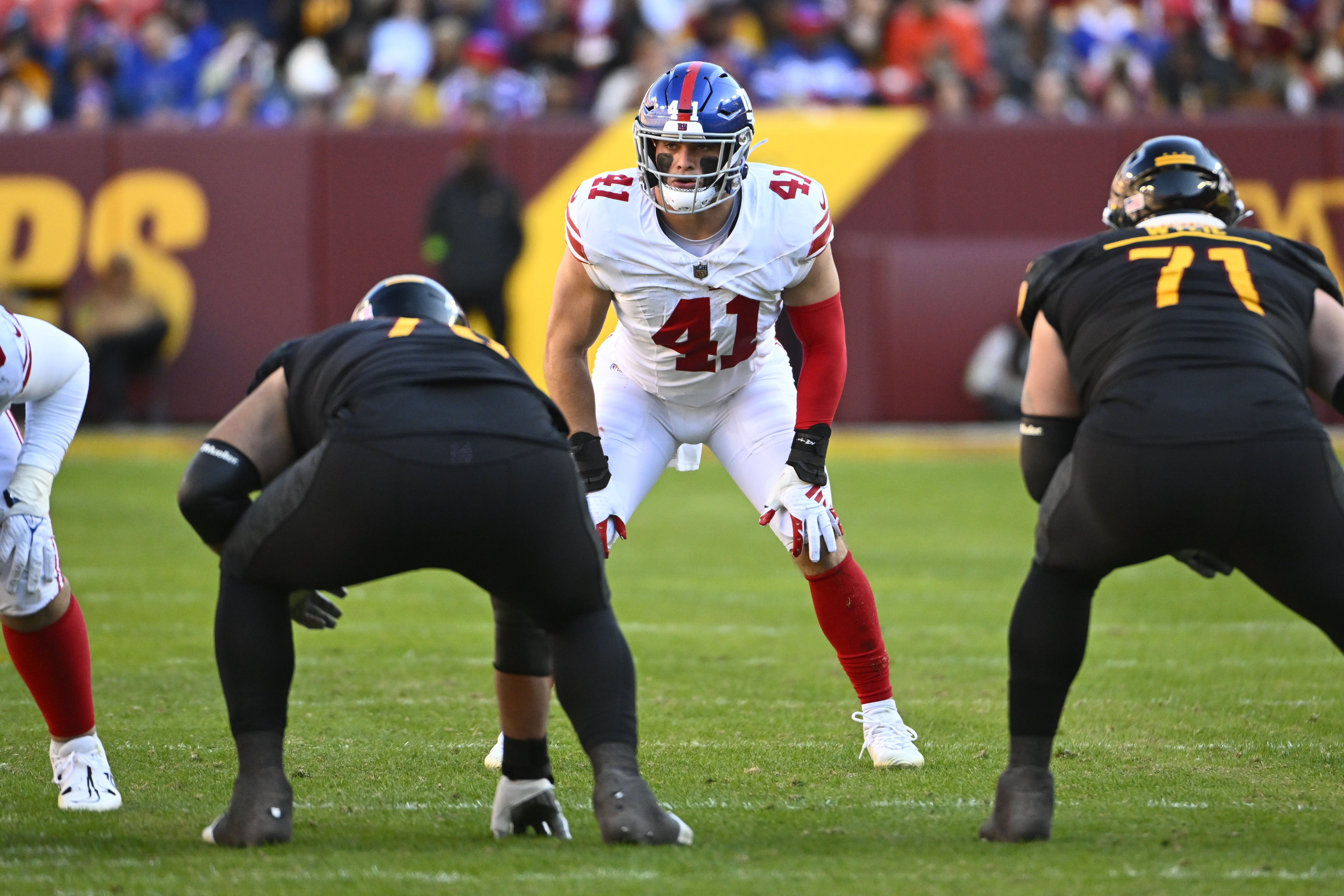 Nov 19, 2023; Landover, Maryland, USA; New York Giants linebacker Micah McFadden (41) at the line of scrimmage against the Washington Commanders during the first half at FedExField. Mandatory Credit: Brad Mills-USA TODAY Sports