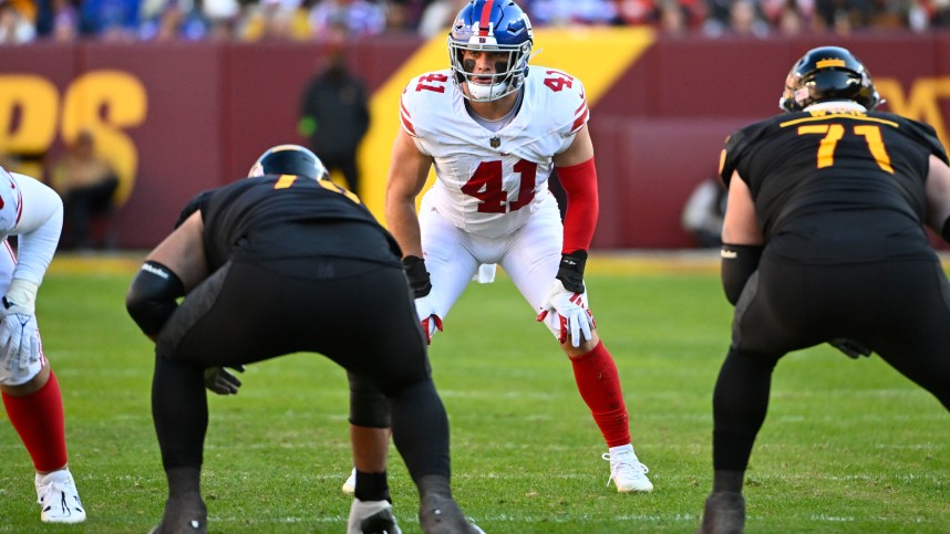 Nov 19, 2023; Landover, Maryland, USA; New York Giants linebacker Micah McFadden (41) at the line of scrimmage against the Washington Commanders during the first half at FedExField. Mandatory Credit: Brad Mills-USA TODAY Sports