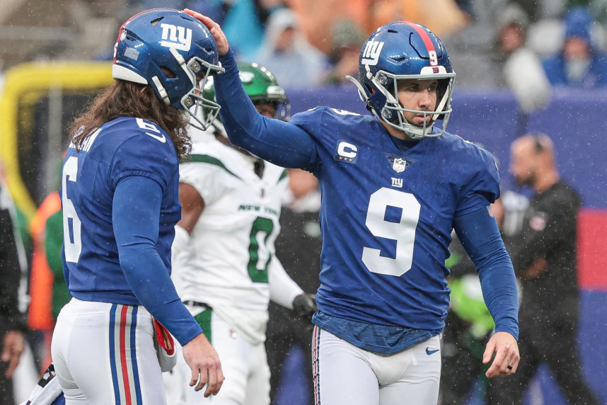 Oct 29, 2023; East Rutherford, New Jersey, USA; New York Giants place kicker Graham Gano (9) celebrates his field goal with punter Jamie Gillan (6) during the first half against the New York Jets at MetLife Stadium. Mandatory Credit: Vincent Carchietta-USA TODAY Sports
