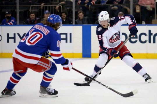 Oct 29, 2021; New York, New York, USA; Columbus Blue Jackets right wing Patrik Laine (29) controls the puck against New York Rangers left wing Artemi Panarin (10) during the second period at Madison Square Garden. Mandatory Credit: Brad Penner-USA TODAY Sports