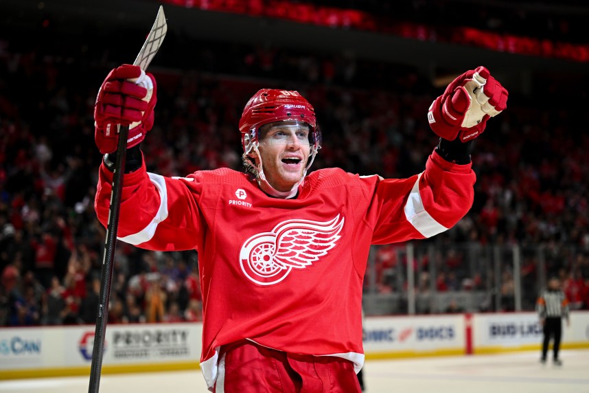 Apr 5, 2024; Detroit, Michigan, USA; Detroit Red Wings right wing Patrick Kane (88) celebrates center Dylan Larkin (not pictured) goal during the second period against the New York Rangers at Little Caesars Arena. Mandatory Credit: Tim Fuller-USA TODAY Sports