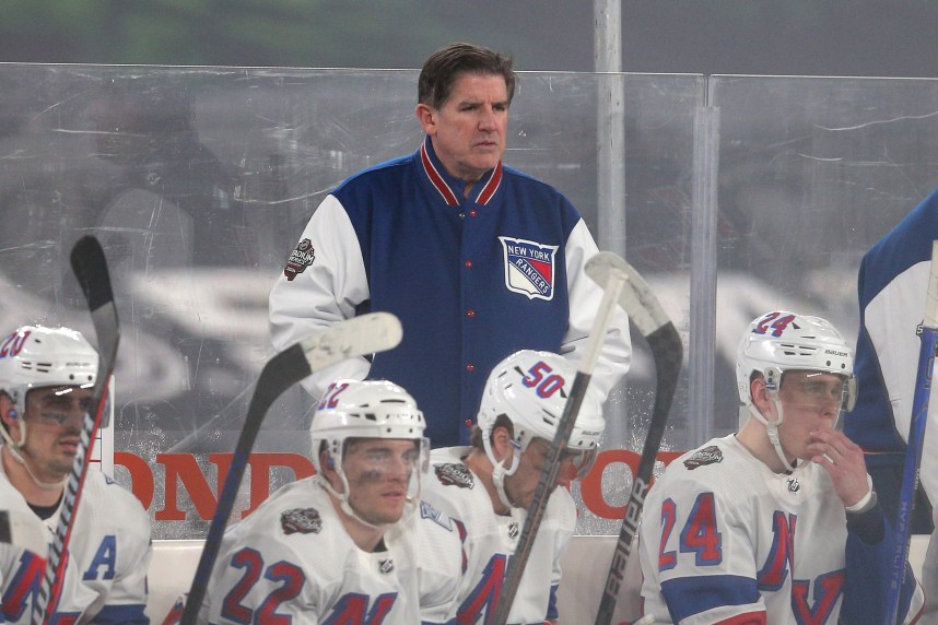 Feb 18, 2024; East Rutherford, New Jersey, USA; New York Rangers head coach Peter Laviolette coaches against the New York Islanders during the third period of a Stadium Series ice hockey game at MetLife Stadium. Mandatory Credit: Brad Penner-USA TODAY Sports