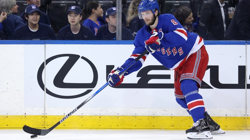 May 22, 2024; New York, New York, USA; New York Rangers defenseman Jacob Trouba (8) controls the puck against the Florida Panthers during the third period of game one of the Eastern Conference Final of the 2024 Stanley Cup Playoffs at Madison Square Garden. Mandatory Credit: Brad Penner-USA TODAY Sports