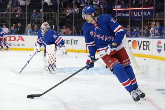 May 24, 2024; New York, New York, USA; New York Rangers center Matt Rempe (73) warms up before a game against the in front of goaltender Igor Shesterkin (31) before game two of the Eastern Conference Final of the 2024 Stanley Cup Playoffs against the Florida Panthers at Madison Square Garden. Mandatory Credit: Vincent Carchietta-USA TODAY Sports