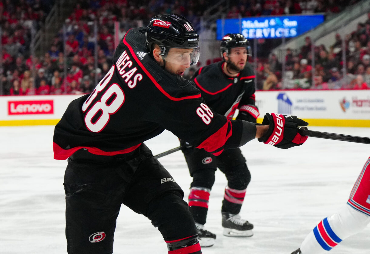 May 11, 2024; Raleigh, North Carolina, USA; Carolina Hurricanes center Martin Necas (88) takes a shot against the New York Rangers during the first period in game four of the second round of the 2024 Stanley Cup Playoffs at PNC Arena. Mandatory Credit: James Guillory-USA TODAY Sports