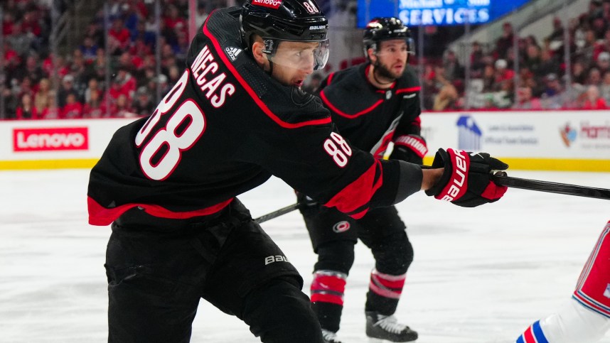 May 11, 2024; Raleigh, North Carolina, USA; Carolina Hurricanes center Martin Necas (88) takes a shot against the New York Rangers during the first period in game four of the second round of the 2024 Stanley Cup Playoffs at PNC Arena. Mandatory Credit: James Guillory-USA TODAY Sports