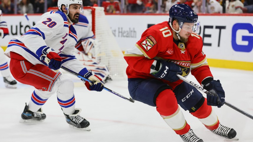 May 26, 2024; Sunrise, Florida, USA; Florida Panthers right wing Vladimir Tarasenko (10) moves the puck past New York Rangers left wing Chris Kreider (20) during the first period in game three of the Eastern Conference Final of the 2024 Stanley Cup Playoffs at Amerant Bank Arena. Mandatory Credit: Sam Navarro-USA TODAY Sports