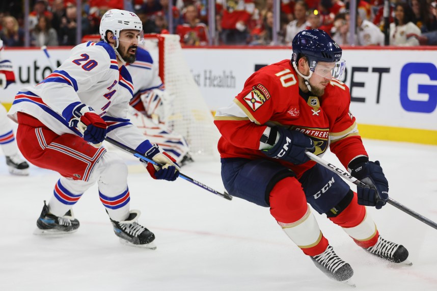 May 26, 2024; Sunrise, Florida, USA; Florida Panthers right wing Vladimir Tarasenko (10) moves the puck past New York Rangers left wing Chris Kreider (20) during the first period in game three of the Eastern Conference Final of the 2024 Stanley Cup Playoffs at Amerant Bank Arena. Mandatory Credit: Sam Navarro-USA TODAY Sports