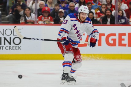 May 28, 2024; Sunrise, Florida, USA; New York Rangers defenseman Adam Fox (23) shoots the puck against the Florida Panthers during the third period in game four of the Eastern Conference Final of the 2024 Stanley Cup Playoffs at Amerant Bank Arena. Mandatory Credit: Sam Navarro-USA TODAY Sports