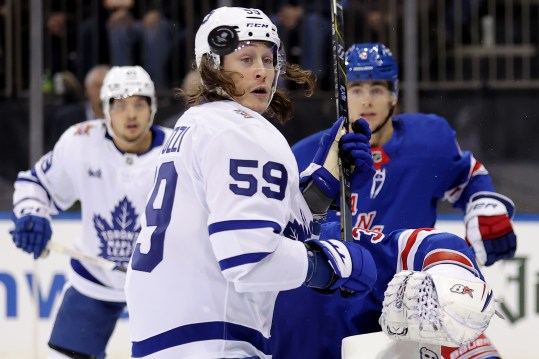 Dec 12, 2023; New York, New York, USA; Toronto Maple Leafs left wing Tyler Bertuzzi (59) watches the puck fly by his head in front of New York Rangers defenseman Braden Schneider (4) and goaltender Igor Shesterkin (31) during the third period at Madison Square Garden. Mandatory Credit: Brad Penner-USA TODAY Sports